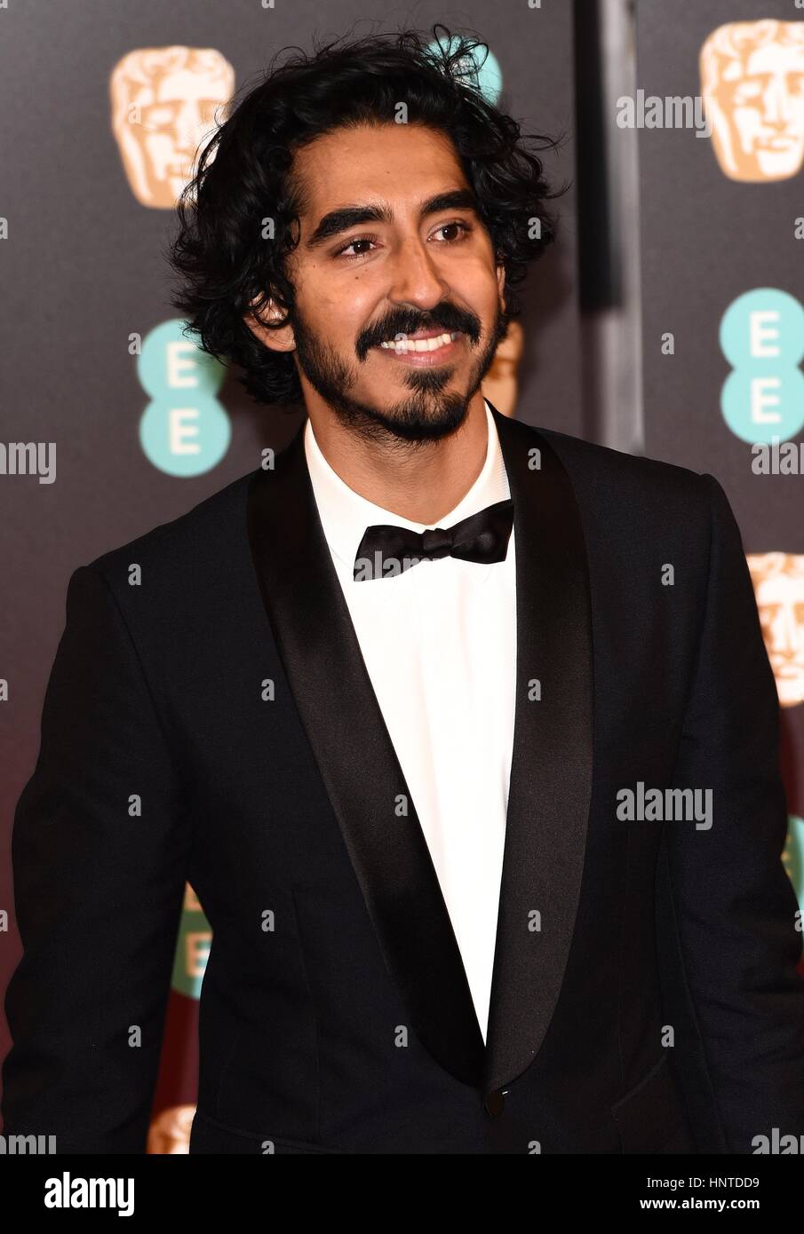 London, UK. Dev Patel at the EE British Acadamy Film Awards (BAFTA's ...