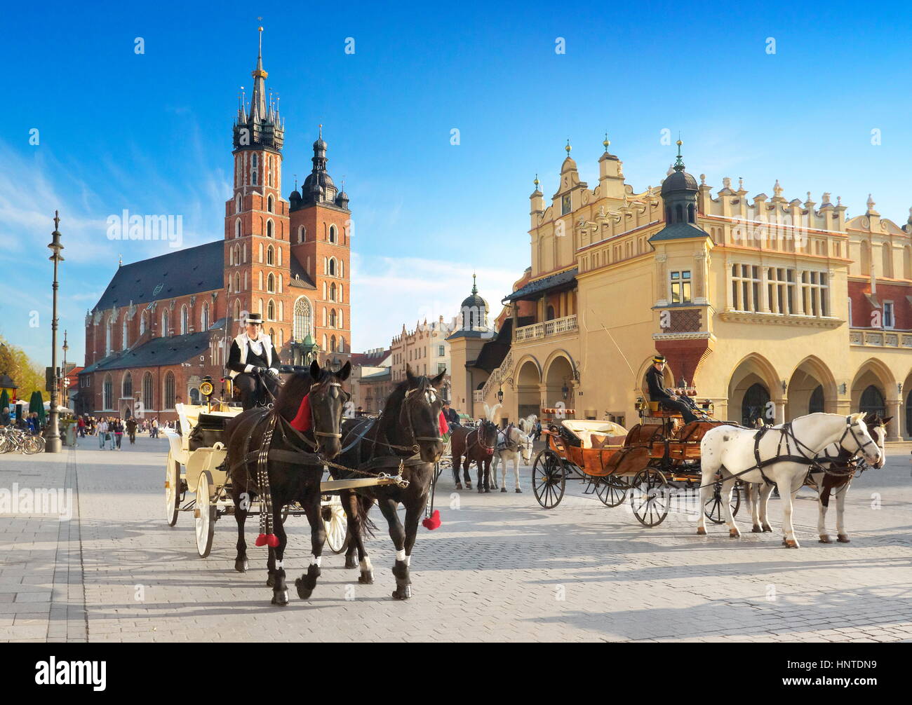 Cracow - Market Square, St Mary's Church and Sukiennice, Poland Stock Photo