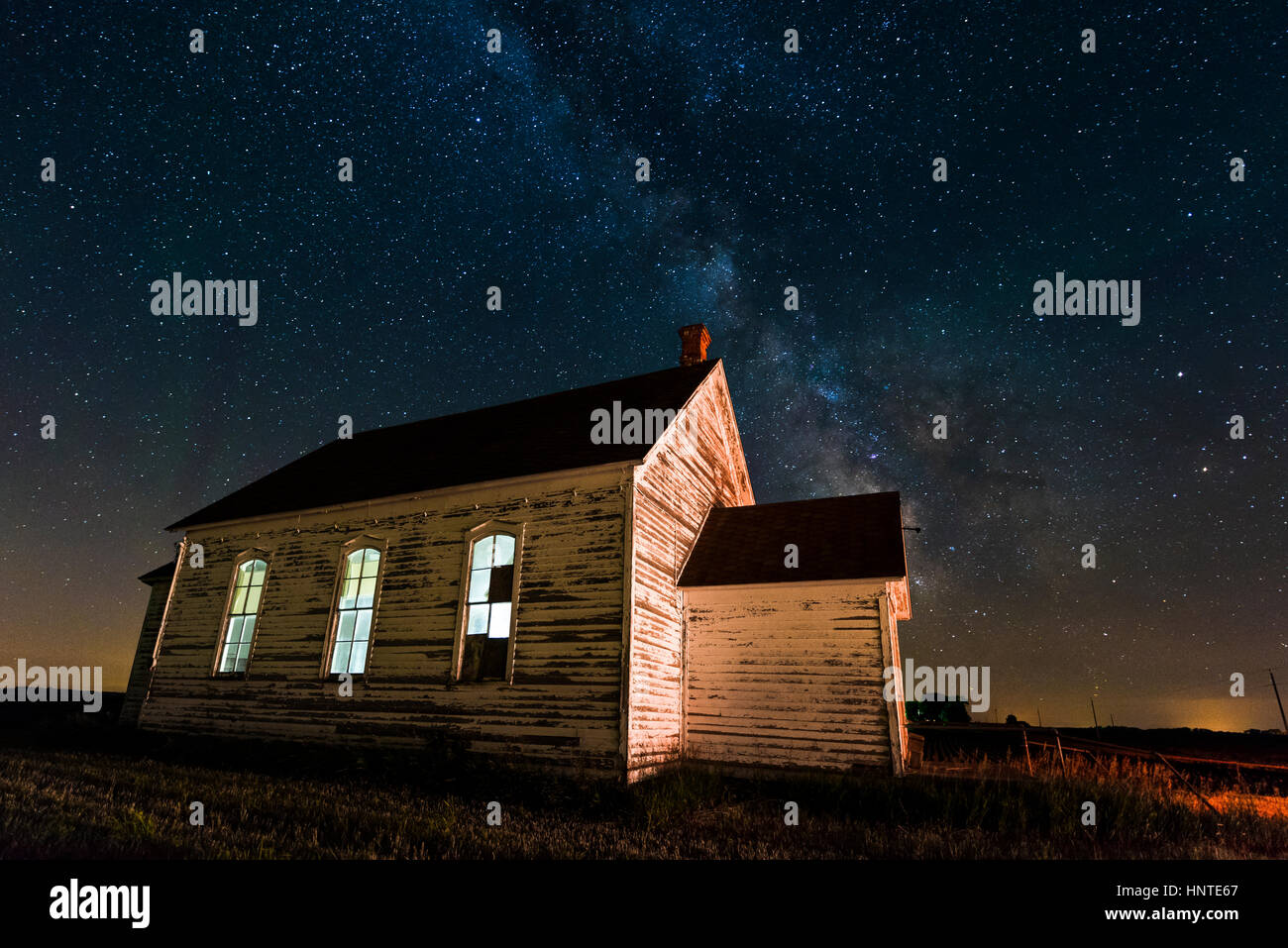 The milky Way Galaxy above an old Finnish church in southwest Minnesota. Stock Photo
