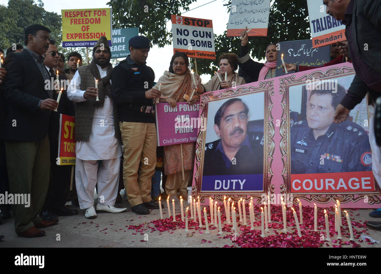 Pakistani members of civil society holding placards stage protest during demonstration against bomb blast. At least 19 people were killed and 90 others injured when a suicide bomber hit protestors outside provincial assembly in Pakistan's Punjab province on Monday evening. Four suicide bombers struck Pakistan in one day on February 15, 2017, killing six people and unnerving citizens whose growing sense of security has been shaken by multiple Taliban blasts this week. The latest assault happened in the northwestern city of Peshawar, said police, after a bomber rode a motorcycle into a van carry Stock Photo