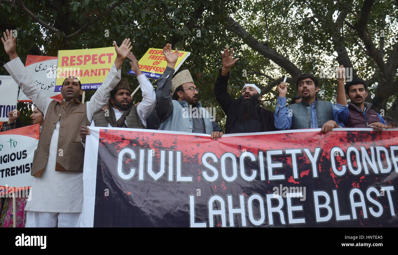 Pakistani members of civil society holding placards stage protest during demonstration against bomb blast. At least 19 people were killed and 90 others injured when a suicide bomber hit protestors outside provincial assembly in Pakistan's Punjab province on Monday evening. Four suicide bombers struck Pakistan in one day on February 15, 2017, killing six people and unnerving citizens whose growing sense of security has been shaken by multiple Taliban blasts this week. The latest assault happened in the northwestern city of Peshawar, said police, after a bomber rode a motorcycle into a van carry Stock Photo