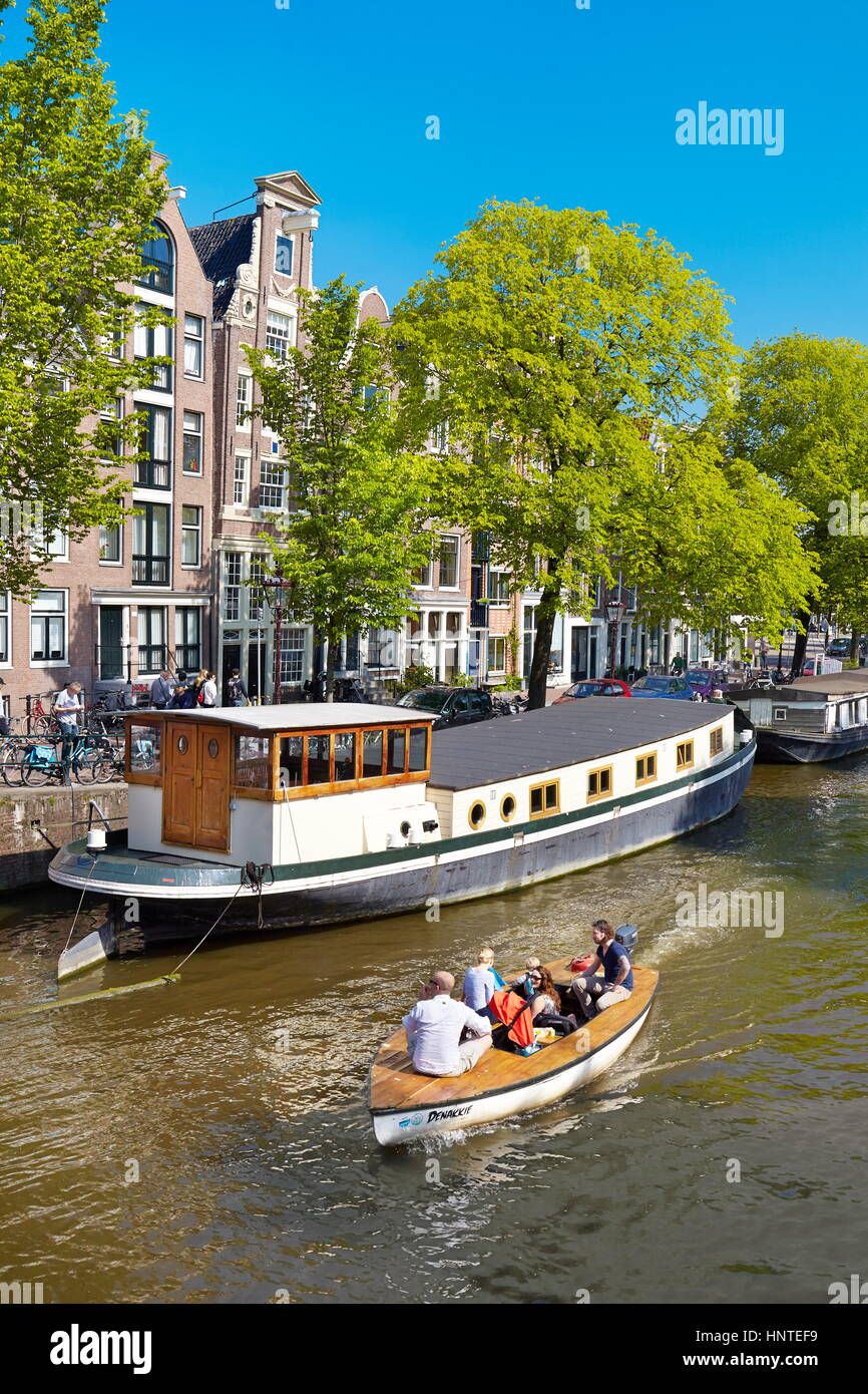 Amsterdam, Houseboat barge, Amsterdam canal - Holland, Netherlands Stock Photo