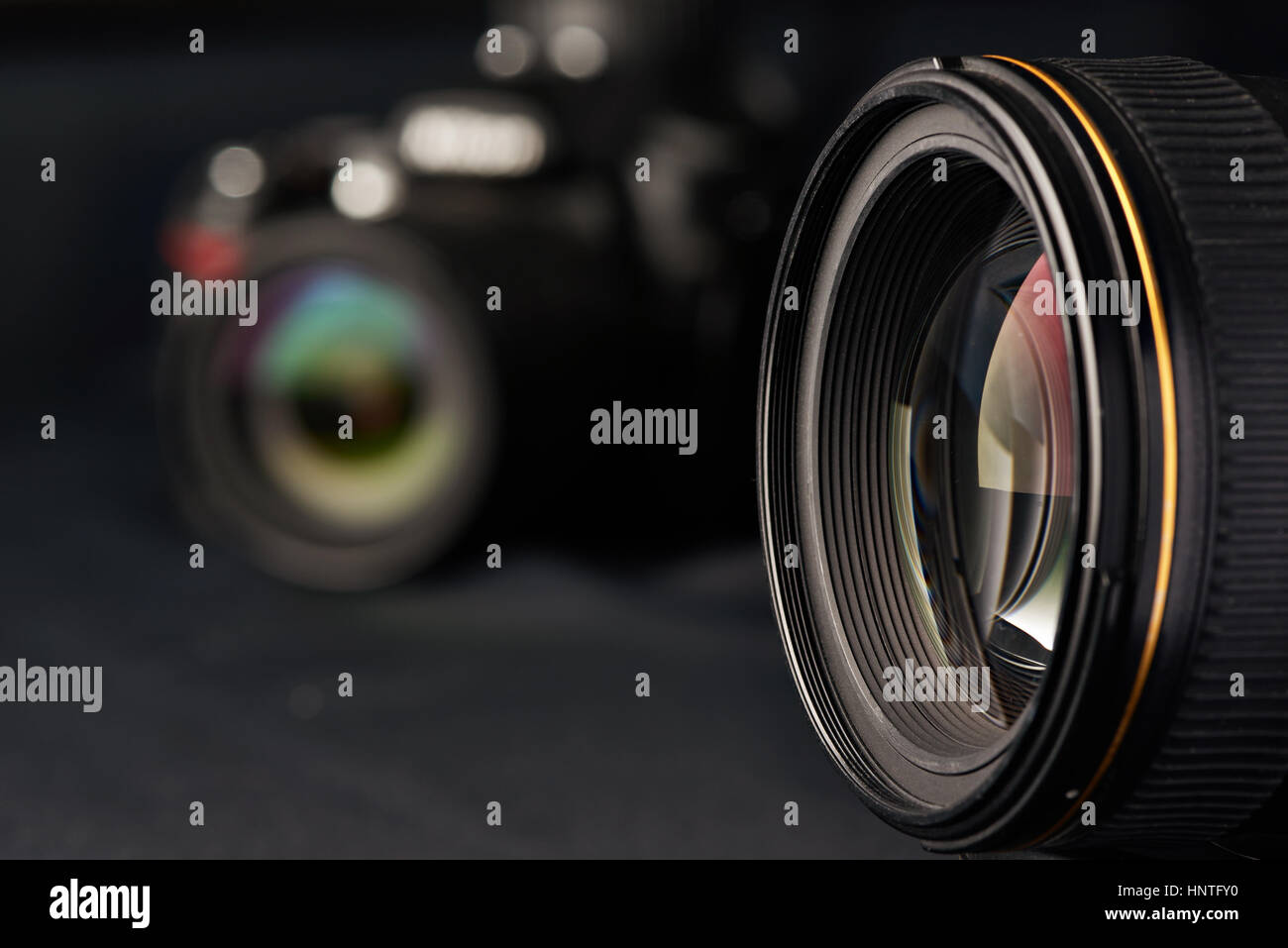 Photo lens side view on blurred camera background Stock Photo Alamy