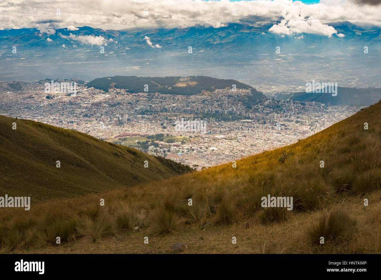 The TelefériQo in Quito, Ecuador, running from the edge of the city up the east side of Pichincha Volcano.View from the top looking at Cruz Loma Stock Photo