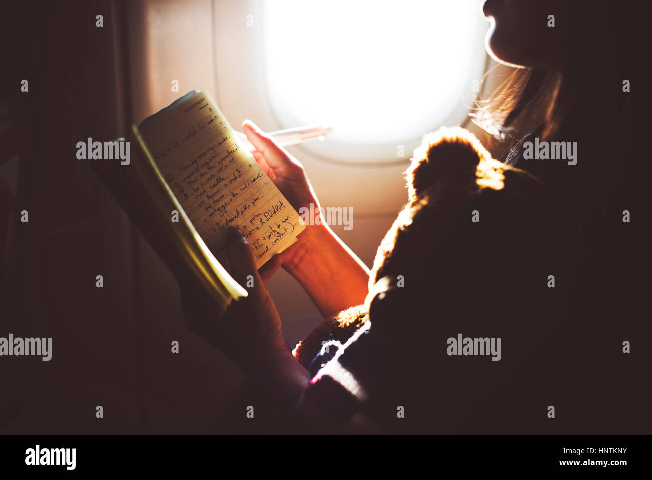Woman Reading Book Plane Flying Concept Stock Photo Alamy
