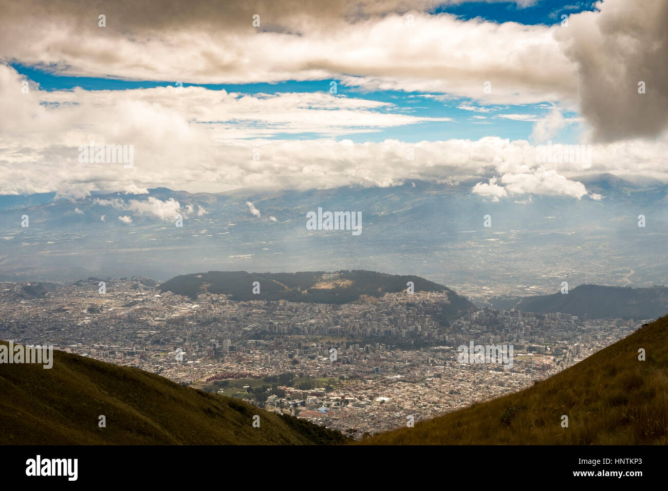 The TelefériQo in Quito, Ecuador, running from the edge of the city up the east side of Pichincha Volcano.View from the top looking at Cruz Loma Stock Photo
