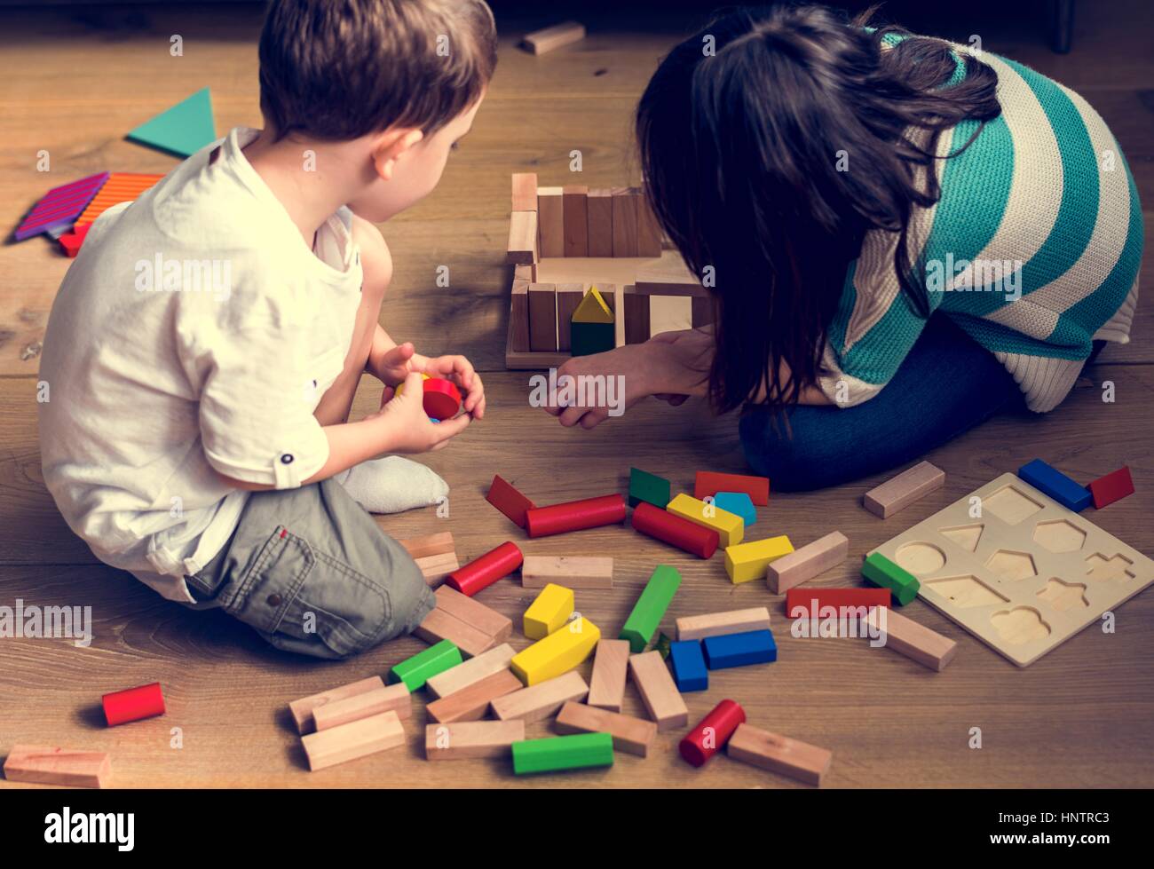 Little Children Playing Toy Blocks Stock Photo