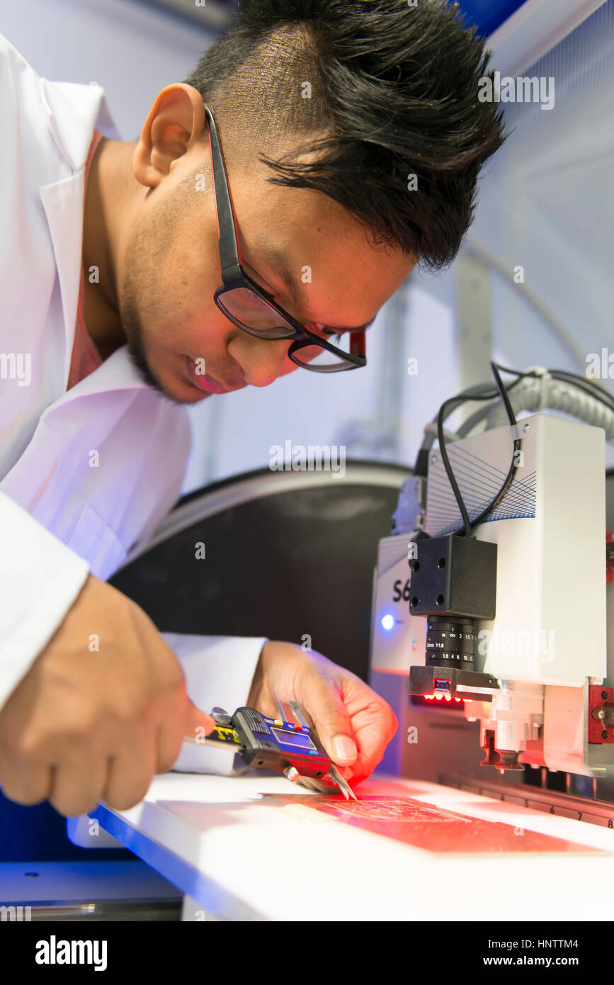 Engineer at work in an electronics lab Stock Photo