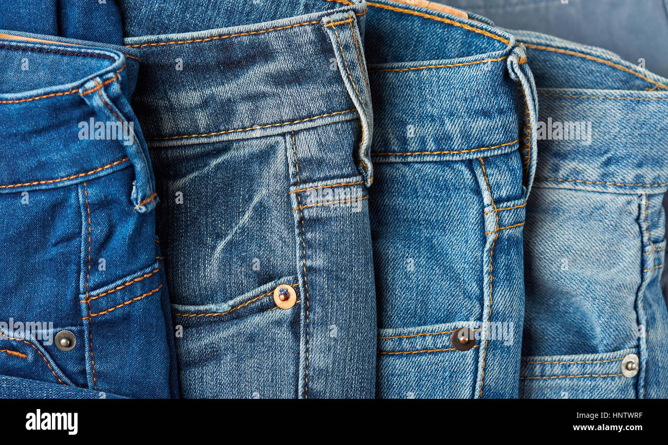 Blue jeans details close up. Different pockets of blue jeans Stock Photo