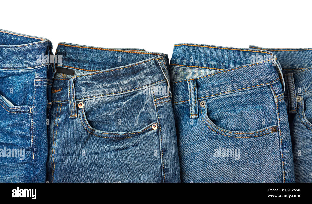 Group blue jeans isolated on white background Stock Photo