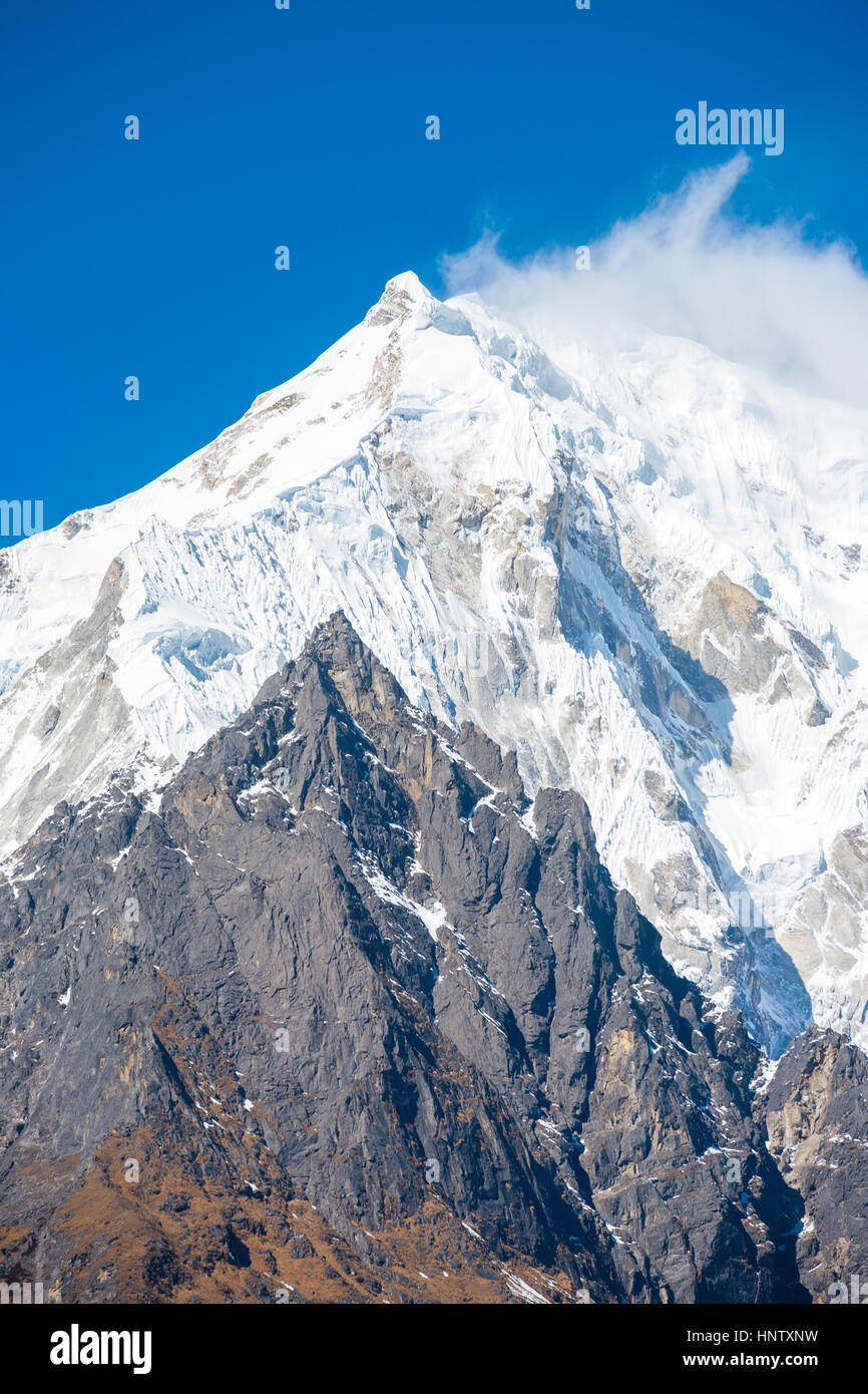 Snowcapped, windswept Langtang Lirung mountain peak, part of Himalayan