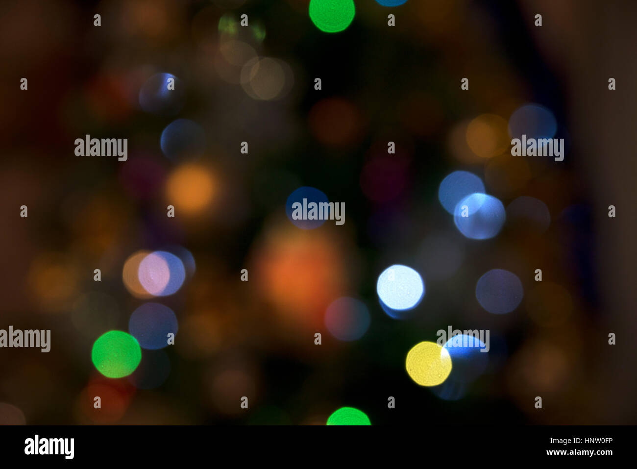 abstruct unfocused red orange blue green and yellow circle lights Stock Photo