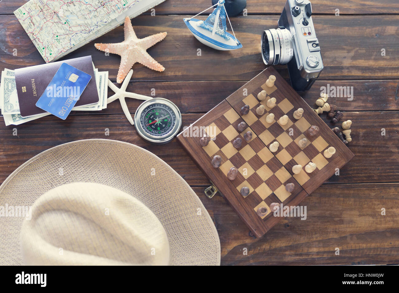 compass, chessboard, hat, passport, banknote money, camera, map