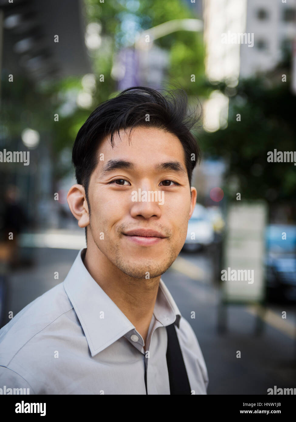 Portrait of smiling Chinese businessman Stock Photo