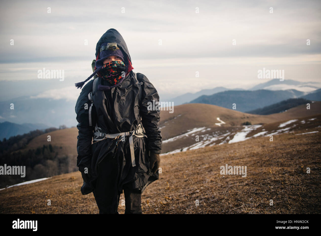 Caucasian woman hiking in mountains Stock Photo - Alamy