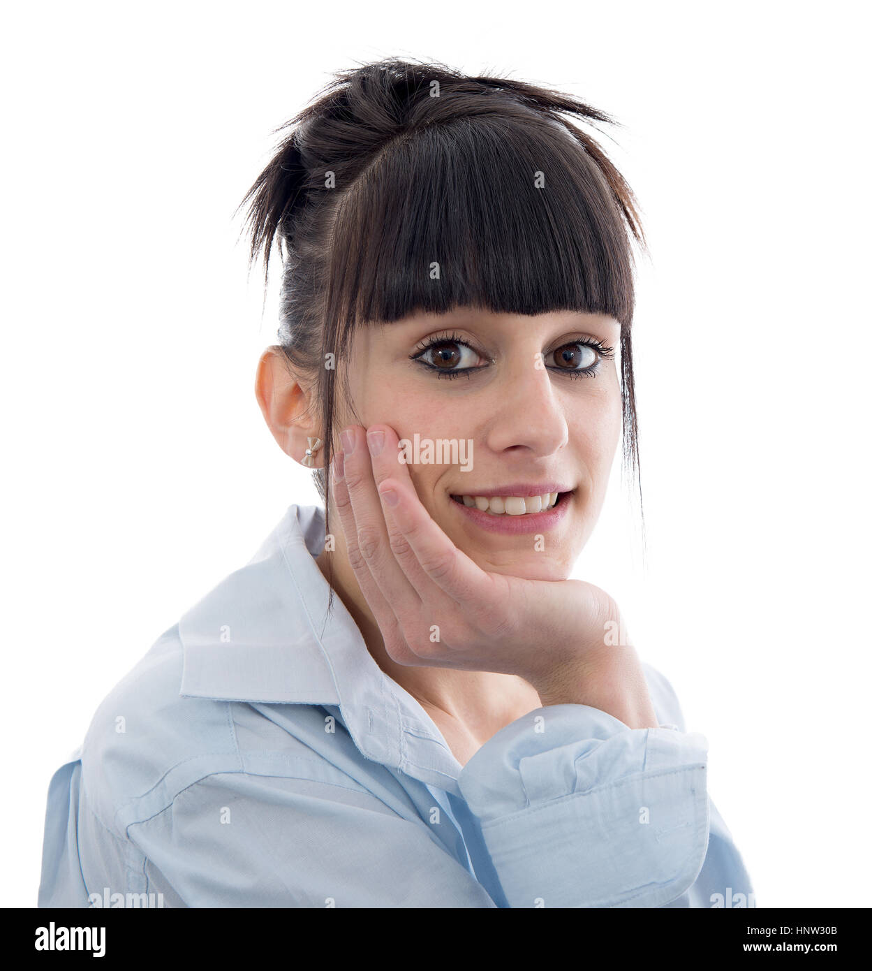 Portrait of a smiling young brunette woman isolated on white background ...