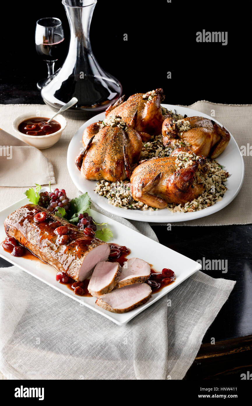 Cornish hens, roasted veal, sauce and red wine Stock Photo