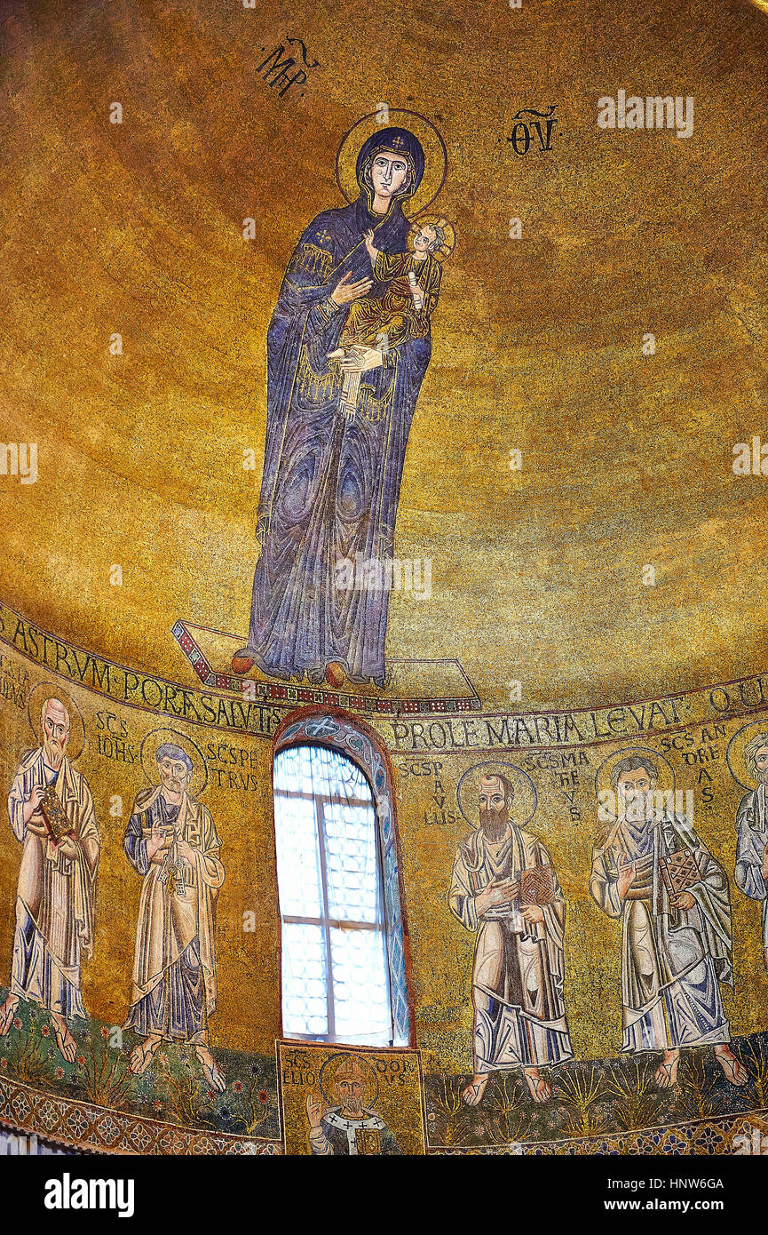 Byzantine Mosaics of the Virgin Mary and Child above the altar of the Cathedral of Santa Maria Assunta (Cattedrale di Santa Maria Assunta) is a basili Stock Photo