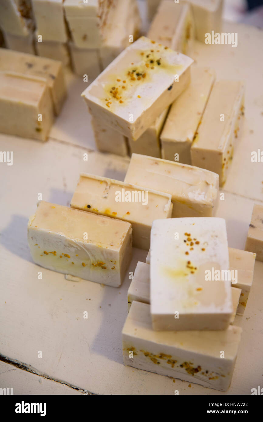 Soap bars on handmade soap workshop table Stock Photo