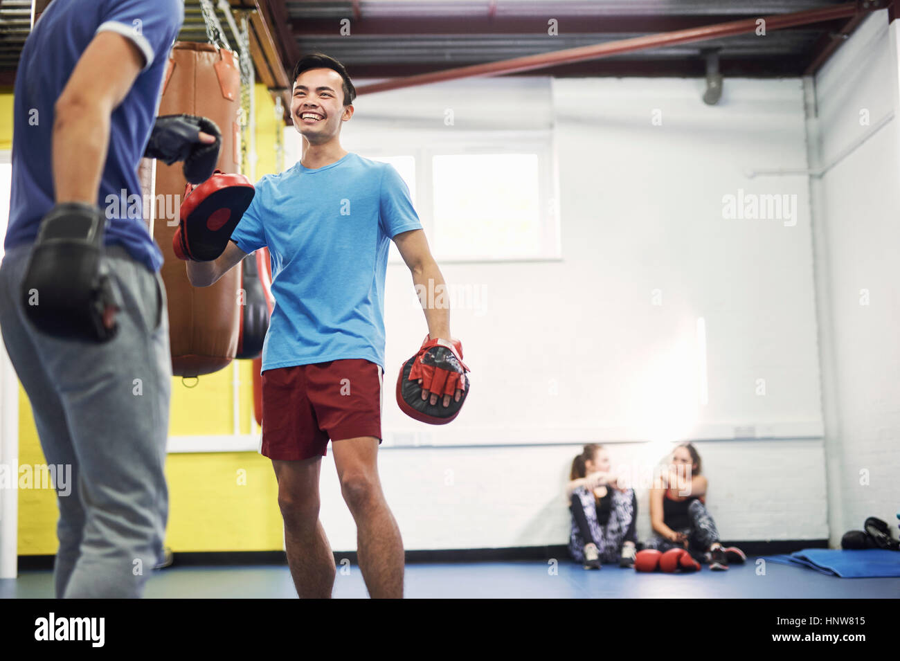 Boxing gloves punch hires stock photography and images Alamy