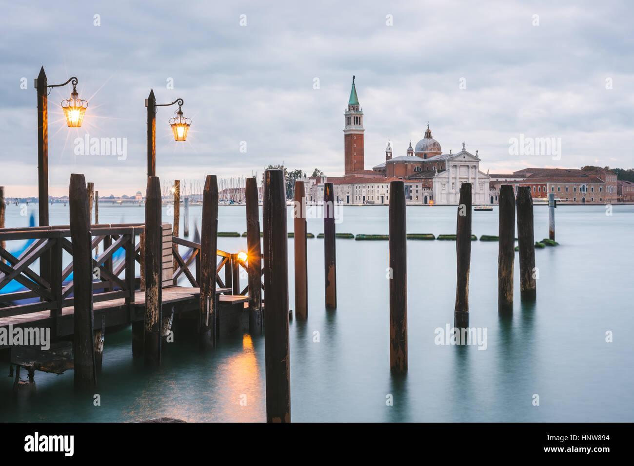 Pier in Grand Canal, San Giorgio Maggiore Island in background, Venice, Italy Stock Photo