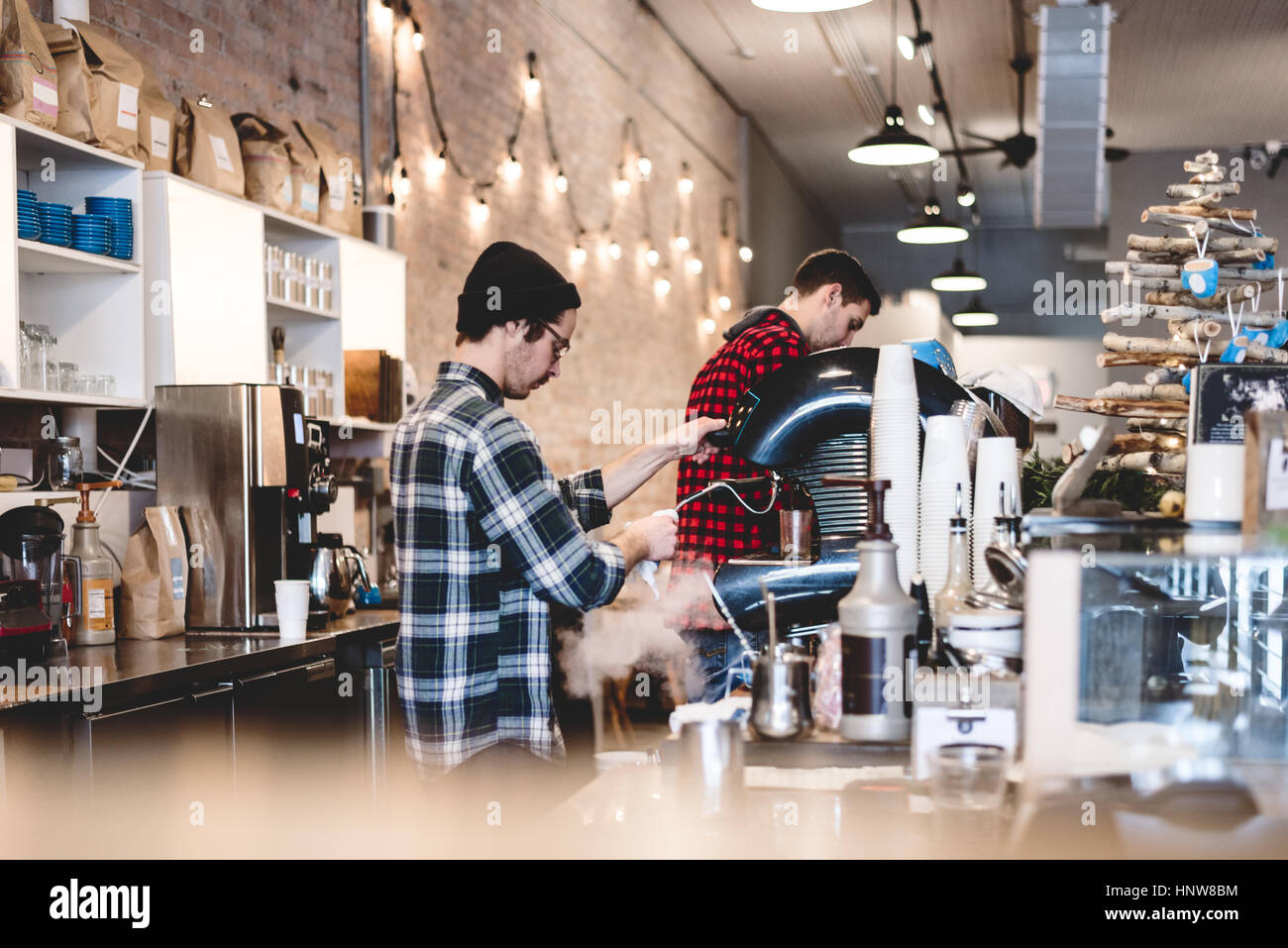 Barista preparing coffee in cafe Stock Photo Alamy