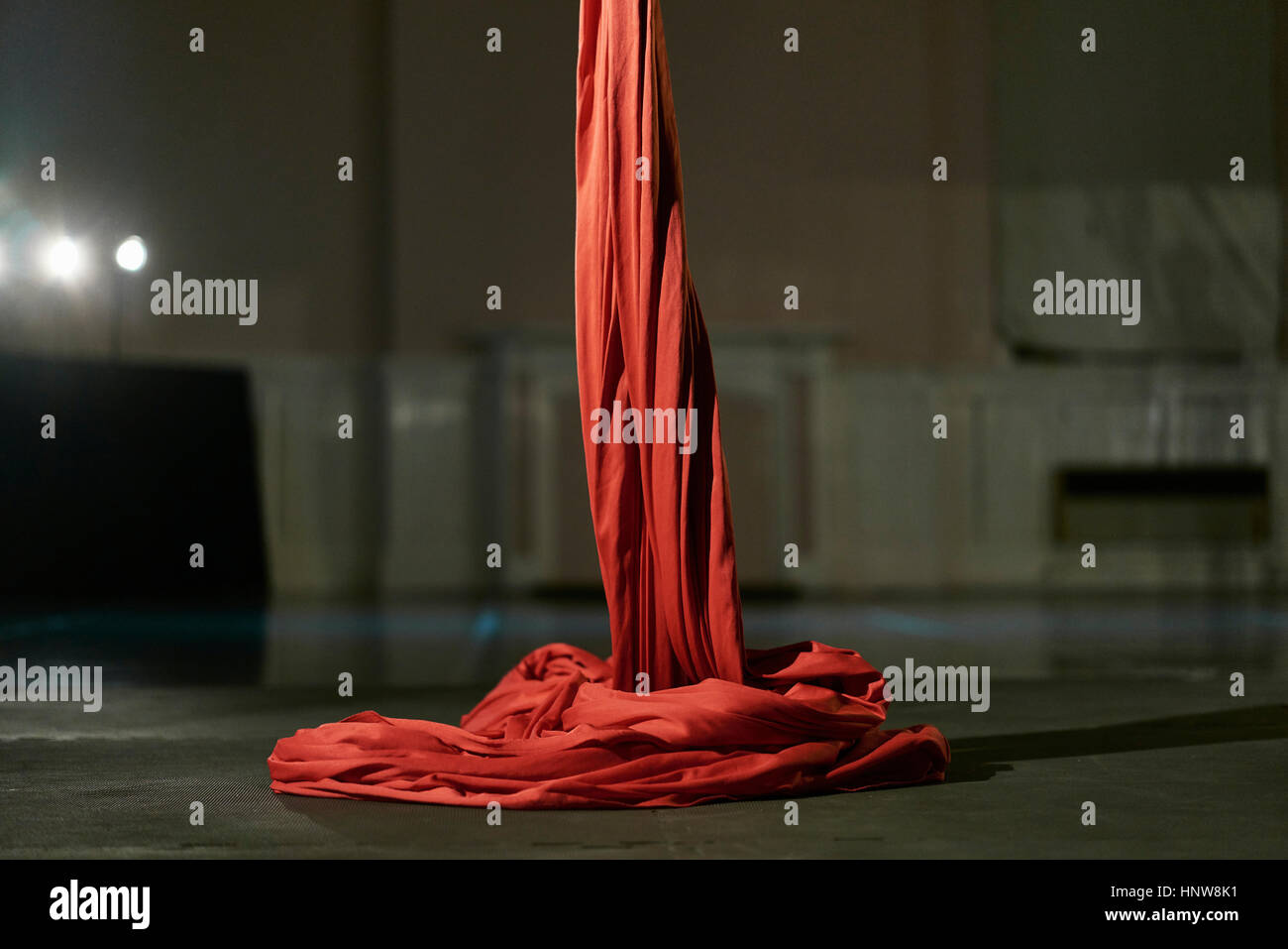 Red silk rope used for aerial acrobatics Stock Photo
