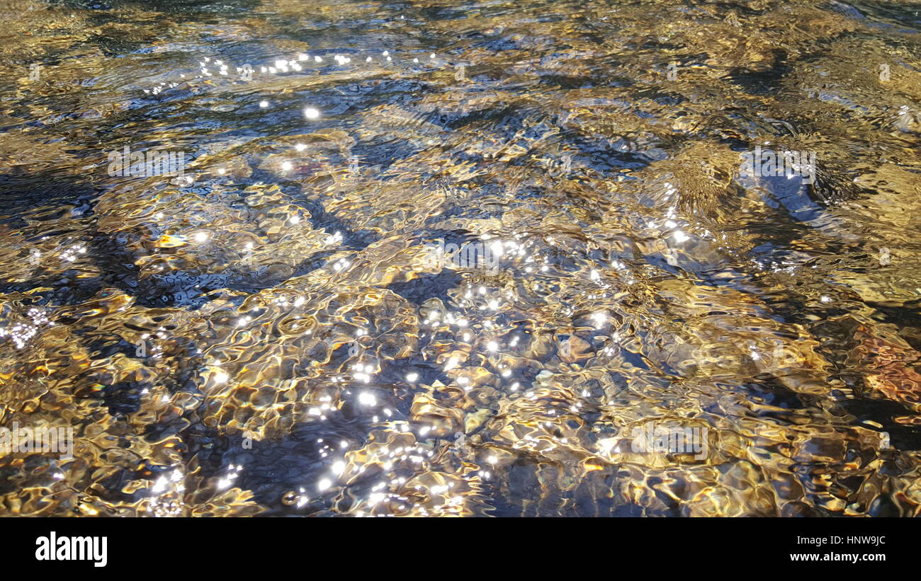 Ripples and Sunlight Stock Photo - Alamy