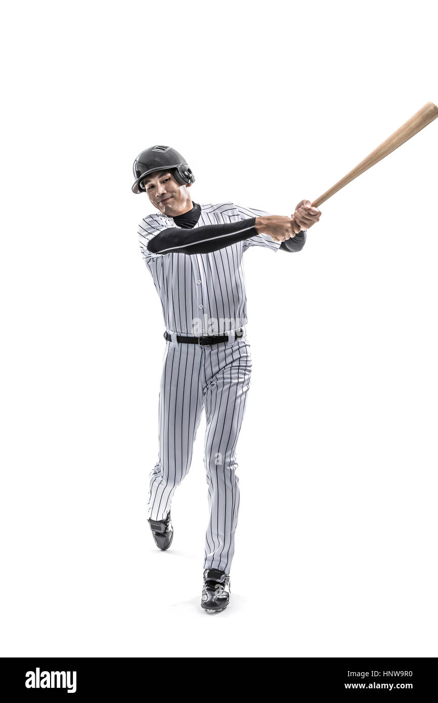 Baseball player swinging a bat Stock Photo Alamy