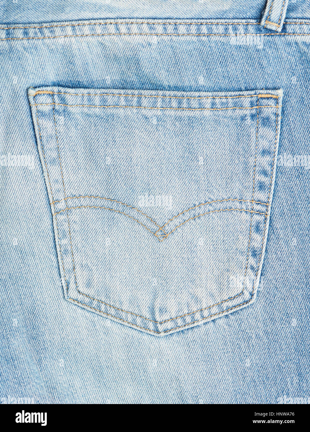 Empty back light blue jeans pocket close up. Macro of jeans pocket Stock Photo