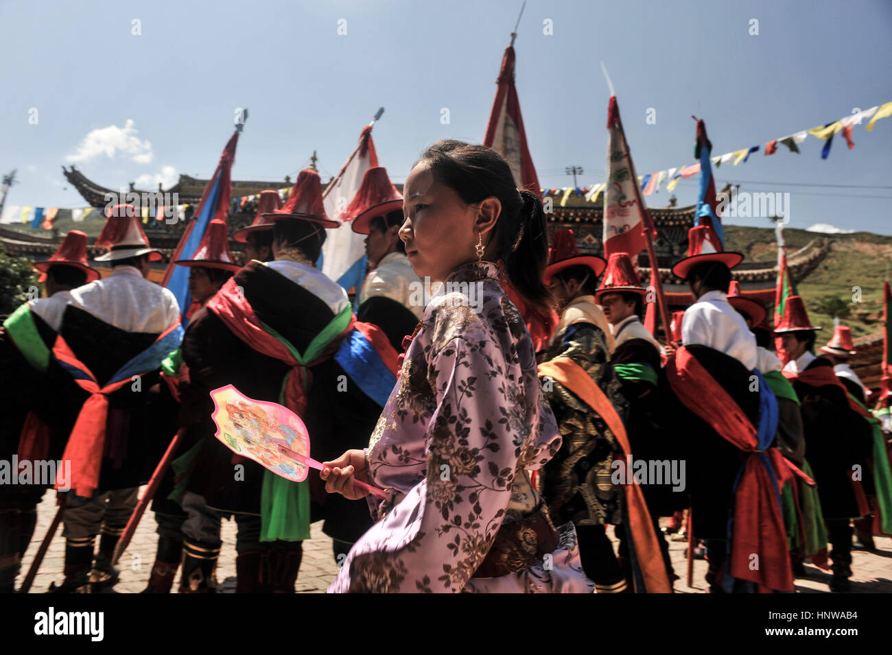 Tibetan culture: Participant(s) at Lurol Shaman Festival, Tongren Stock Photo