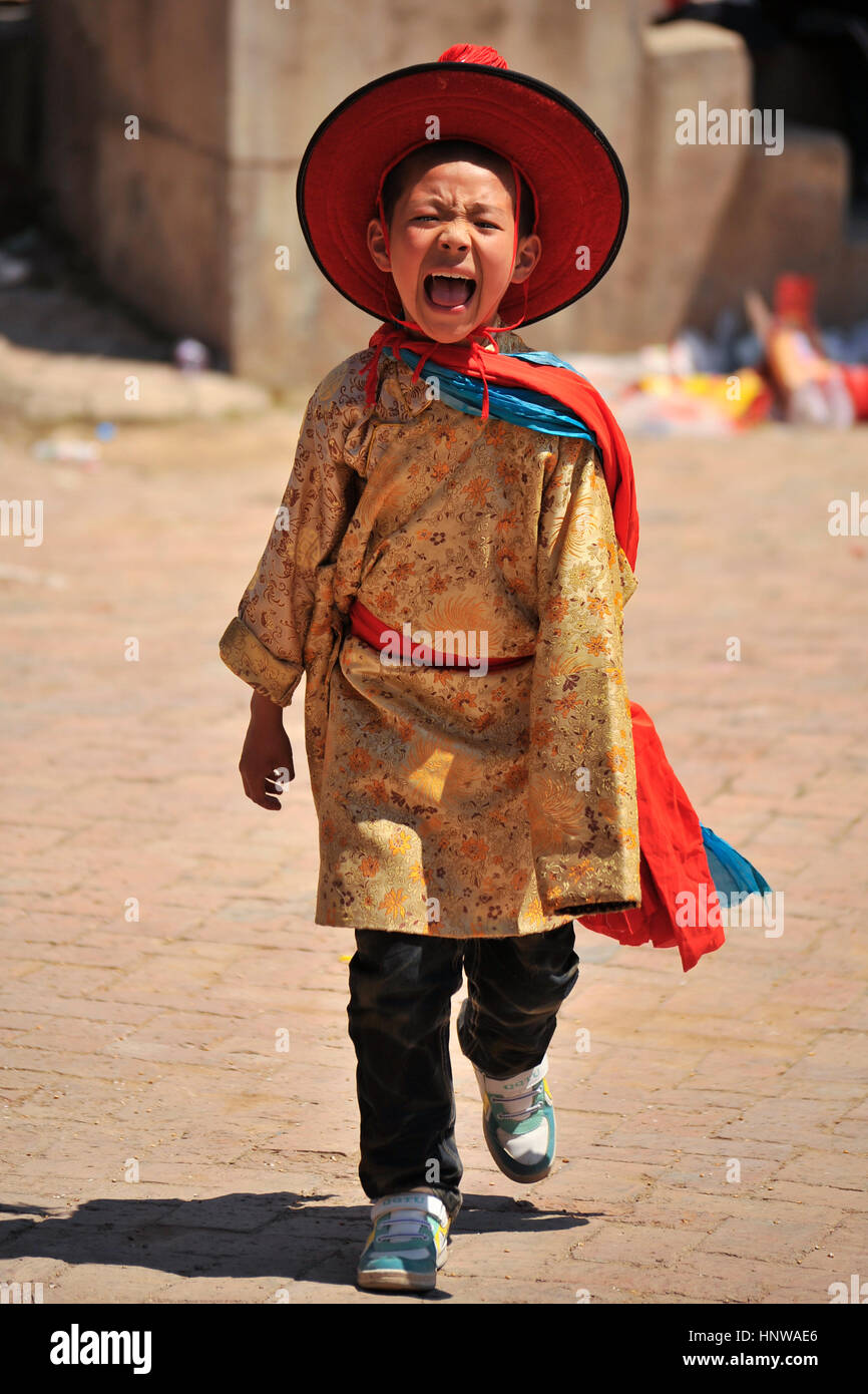 Tibetan culture: Participant(s) at Lurol Shaman Festival, Tongren Stock Photo