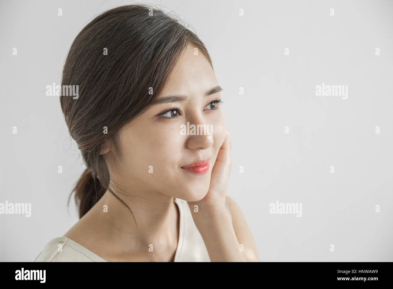 Excited young asian woman portrait hi-res stock photography and images ...