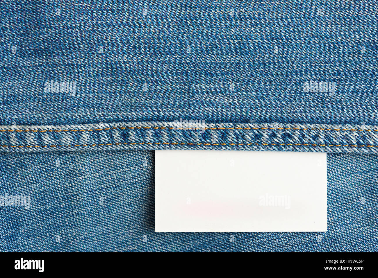white jeans texture tag close up. Horizontal jeans background with stitches Stock Photo