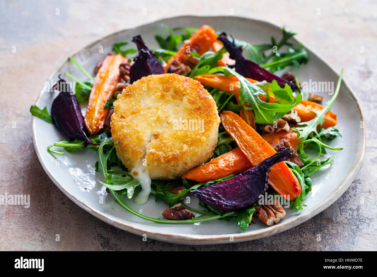 Warm goat cheese with roast vegetable salad Stock Photo Alamy
