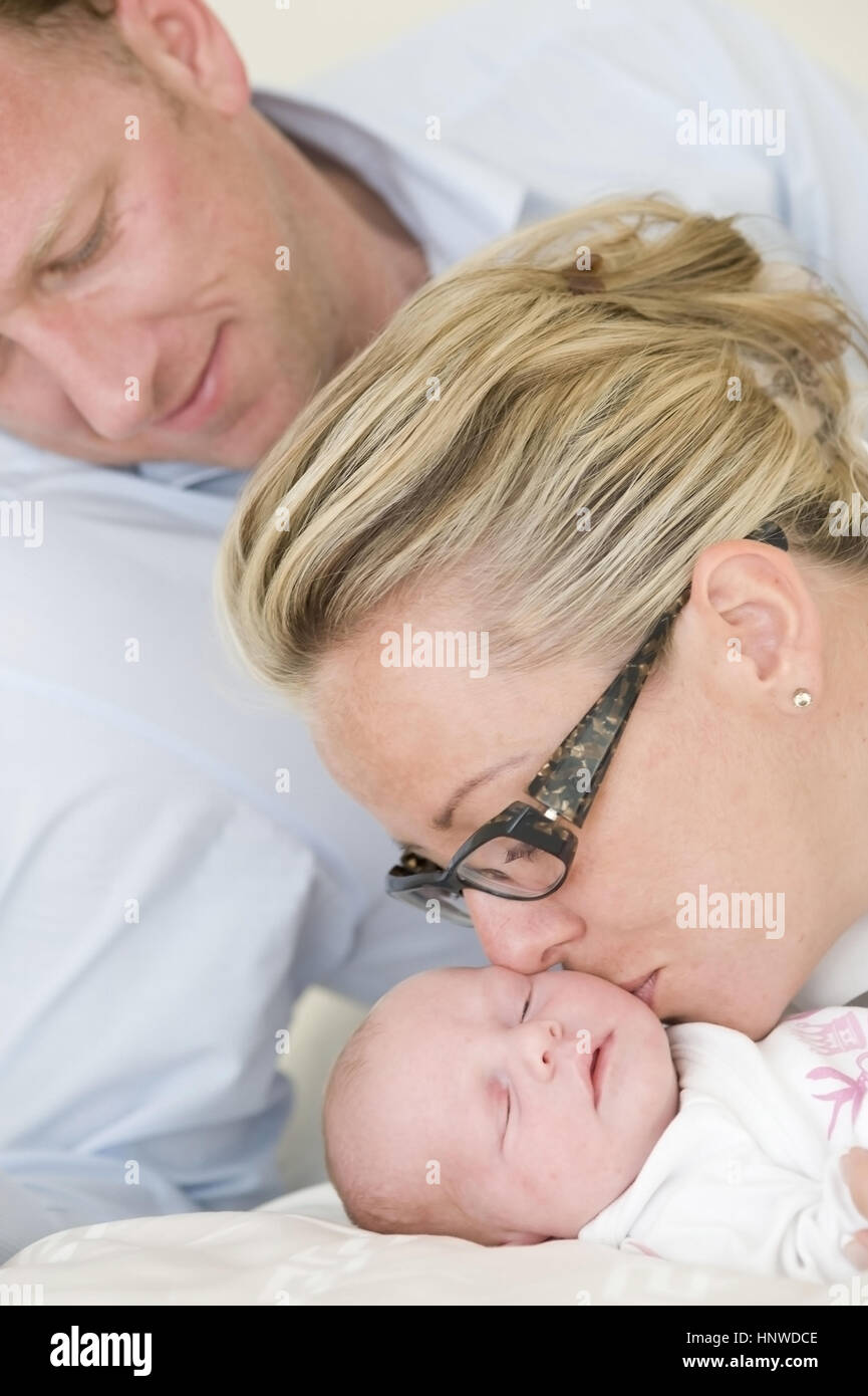 Model release, Glueckliche Eltern mit Baby - parents with baby Stock Photo