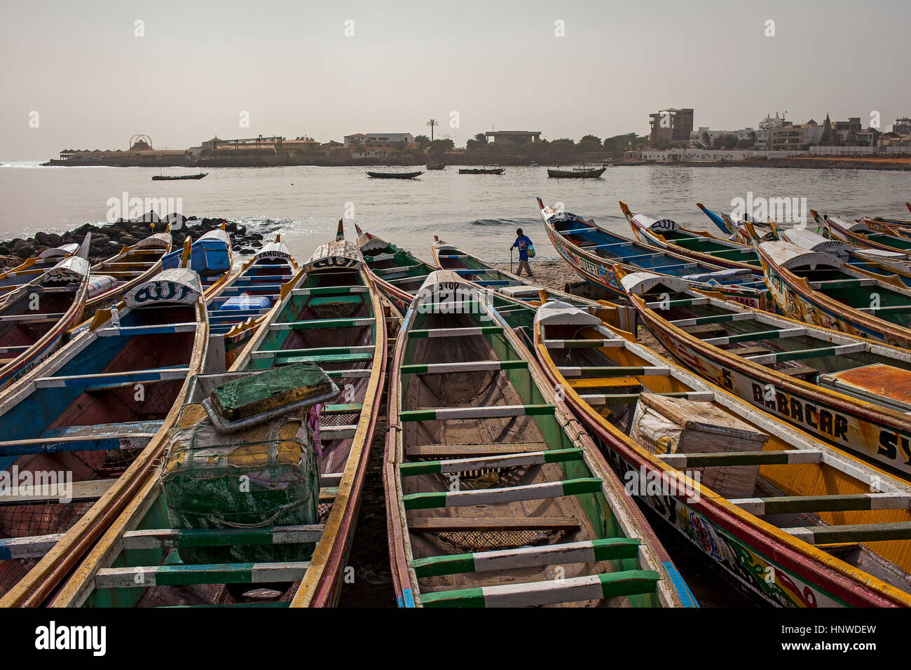 boats at the fish market beach in soumbedioune, Dakar, Senegal Stock Photo