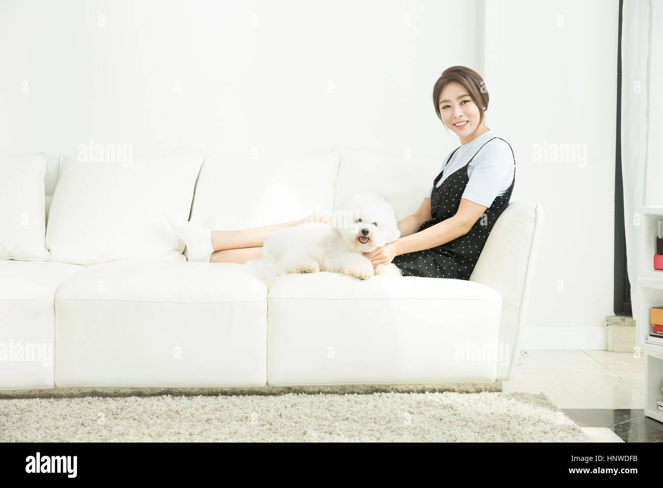Woman with pet dog Stock Photo
