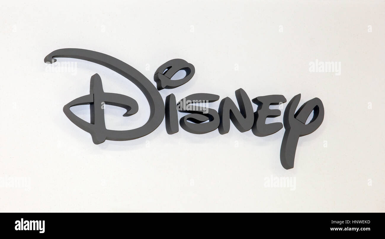 Disney company logo sign. Grey plastic letters on the white wall Stock Photo
