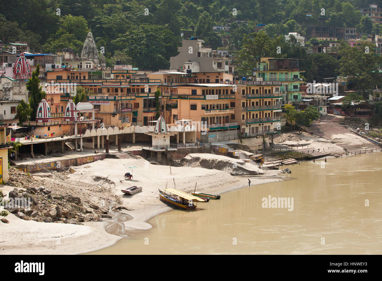 Rishikesh, India - 24 September 2014: Sunset view of the bank of the Ganges River near Lakshman Jhula in Rishikesh, India on 24 September 2014. Stock Photo