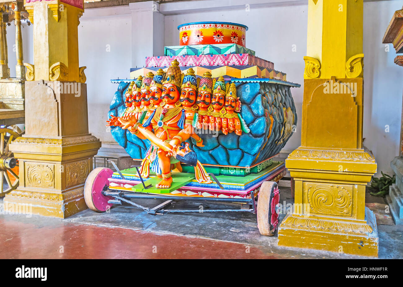 MUNNESWARAM, SRI LANKA - NOVEMBER 25, 2016: The festival cart in Munneswaram Kovil with the sculpture of nine-headed Ravana, holding tenth head in his Stock Photo