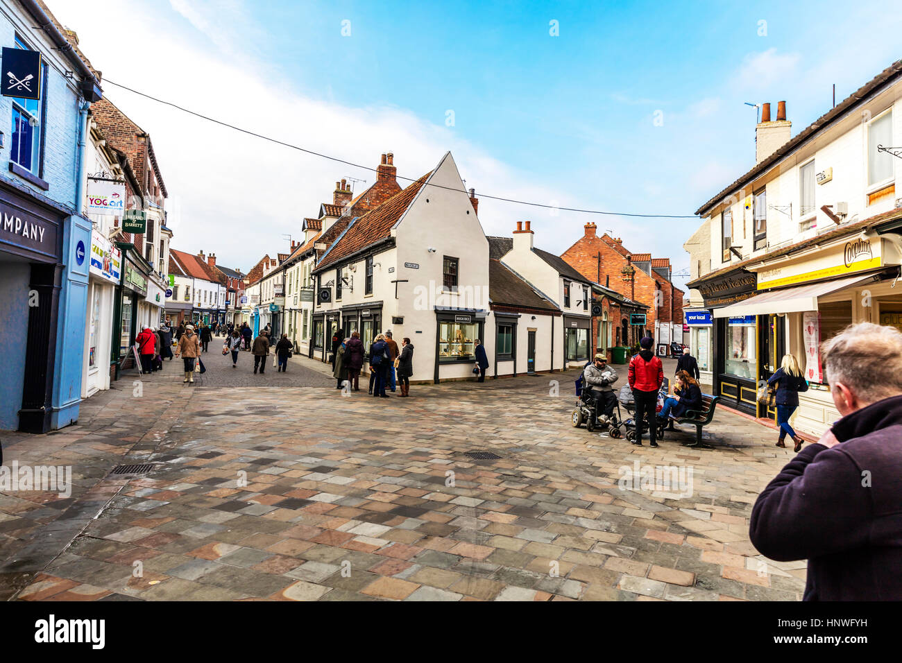 Beverley town centre, center, shops, shoppers, stores outside main street shopping area Beverley Yorkshire UK England Stock Photo