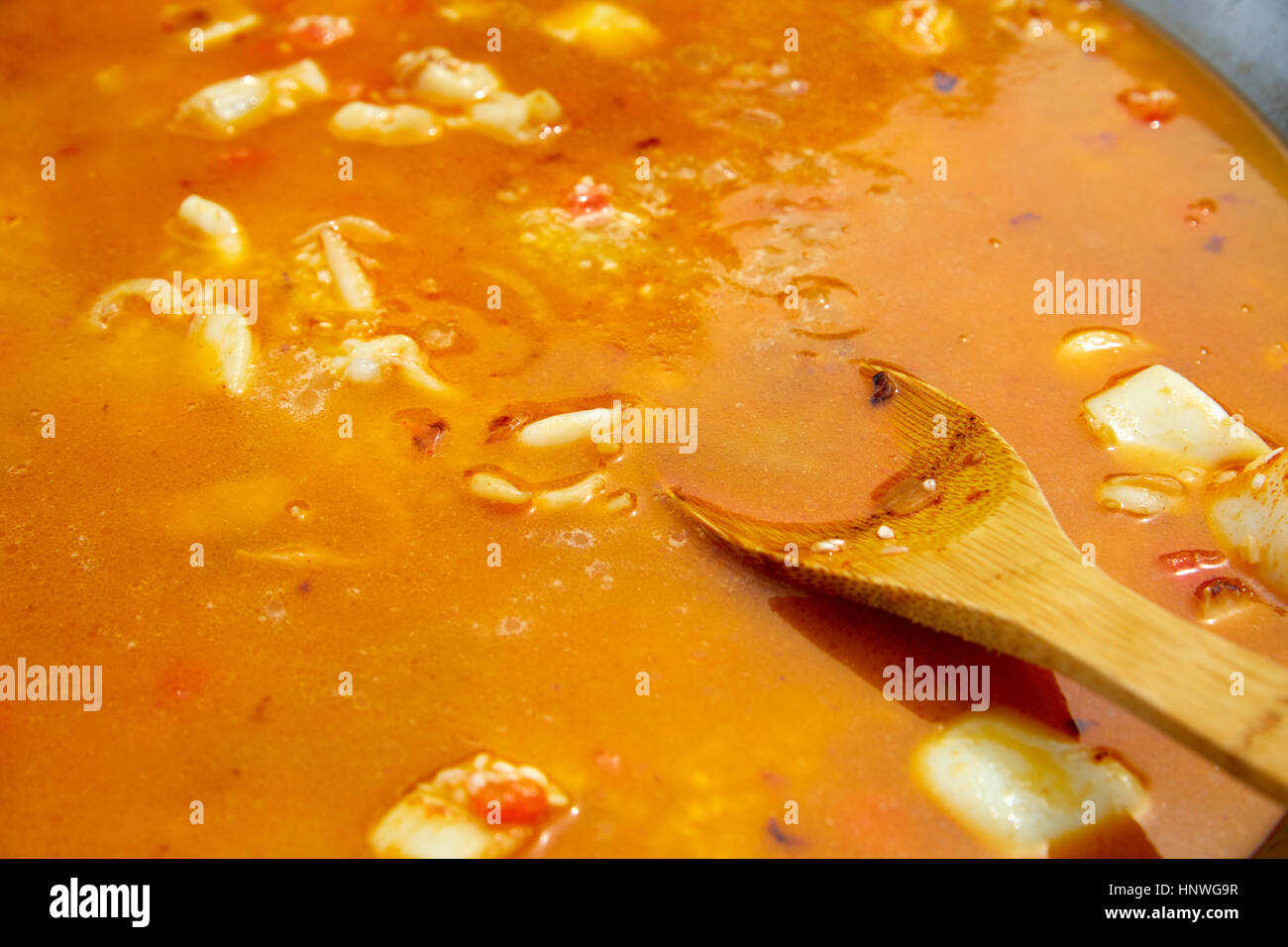 seafood paella from spain recipe ad broth step preparation Stock Photo