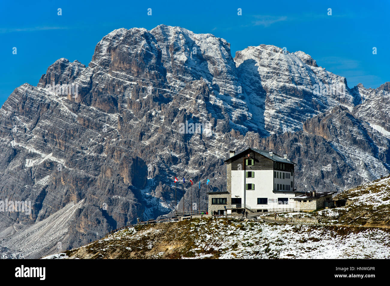 Mountain hut Rifugio Auronzo in front of peak Monte Cristallo, Sexten Dolomites, South Tyrol, Trentino-Alto Adige, Italy Stock Photo
