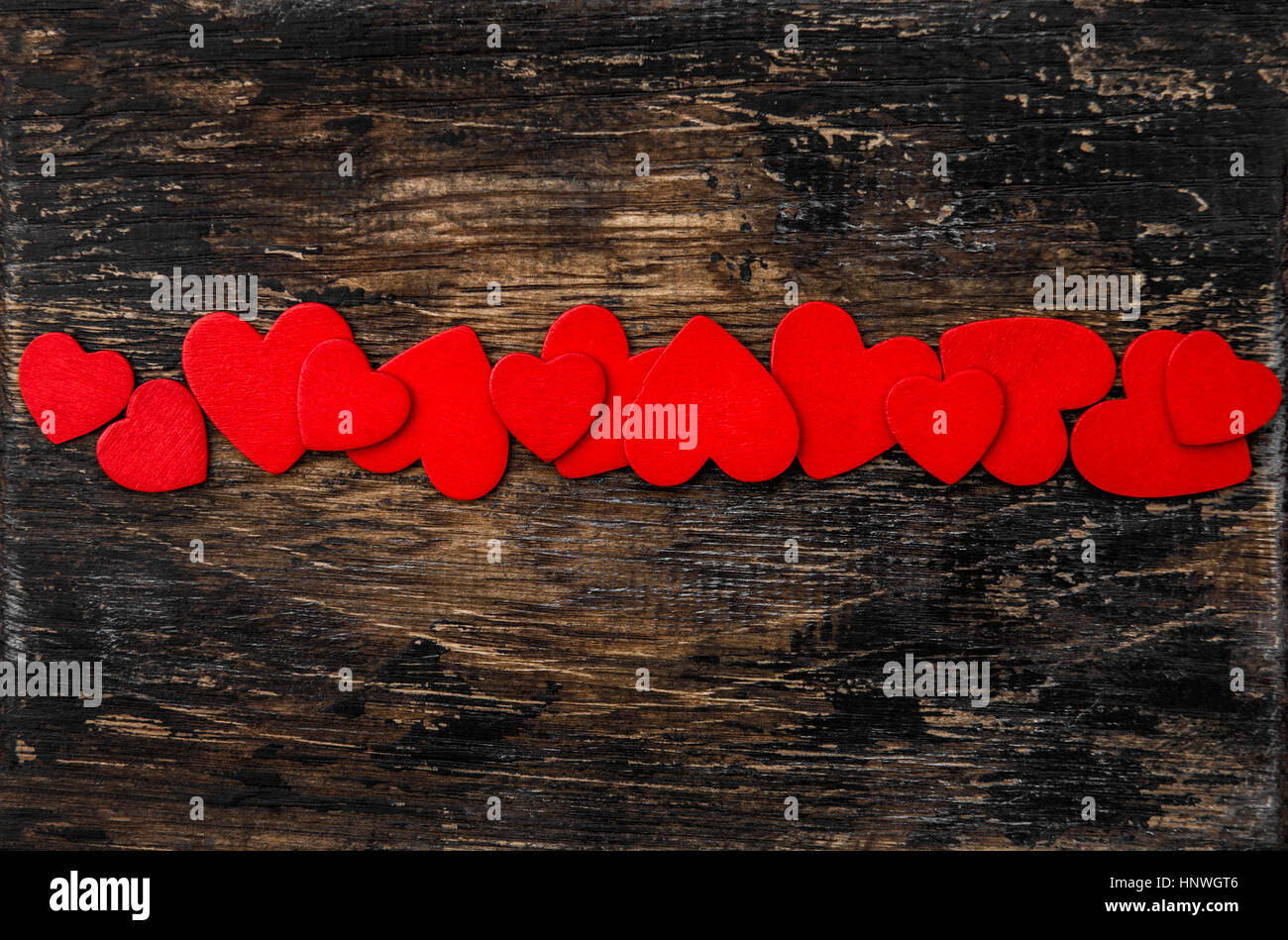Valentines Day Decoration. Red Hearts On Rustic Wooden Background Stock Photo