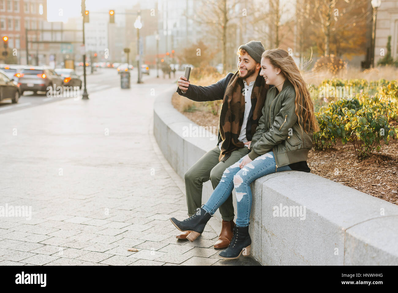 Young couple taking selfie in city, Boston, Massachusetts, USA Stock Photo