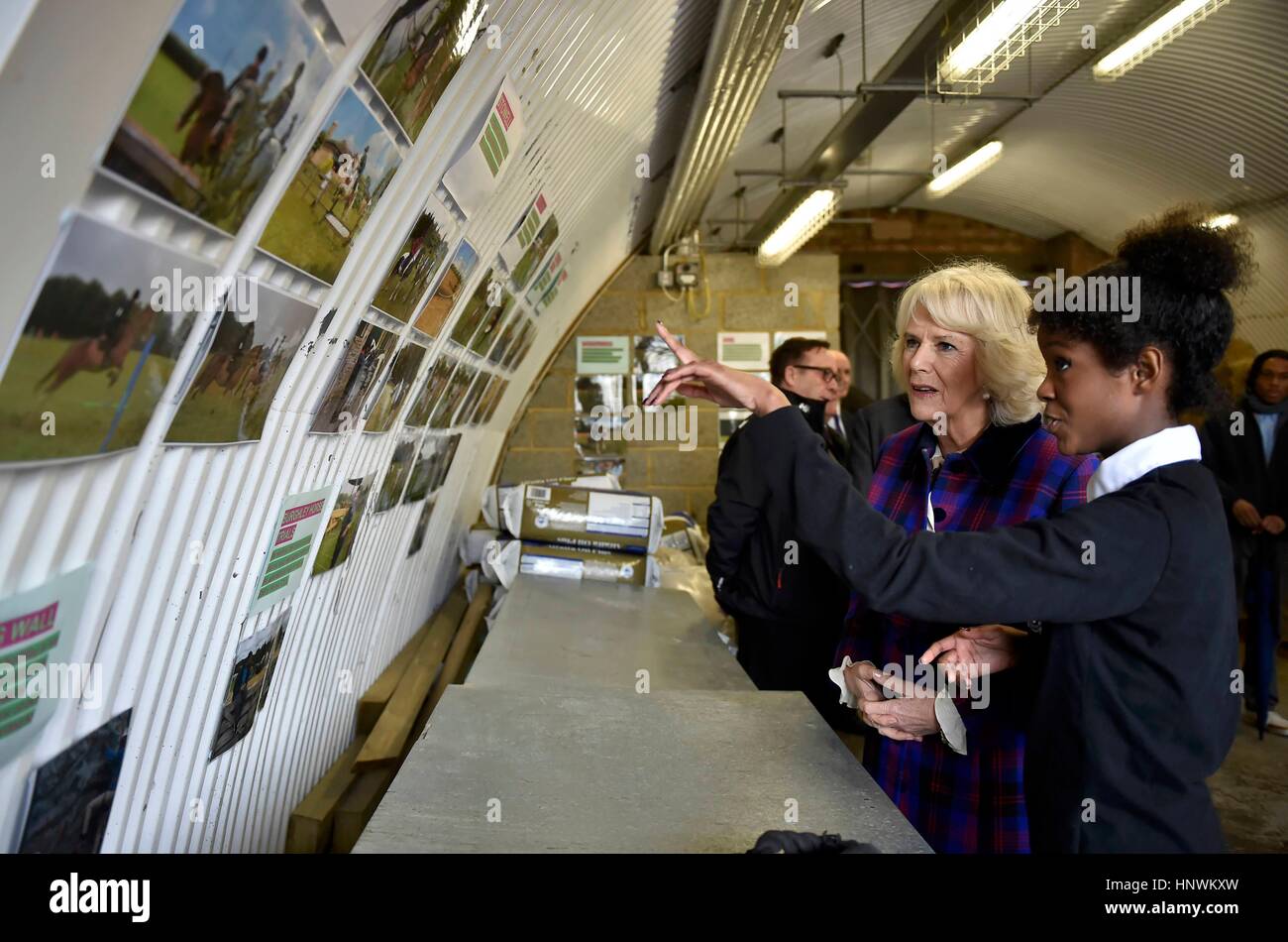 The Duchess of Cornwall, President of the Ebony Horse Club, with Natasha Williams, 19, as she visits the charity's Brixton riding centre to celebrate the club's 21st anniversary. Stock Photo