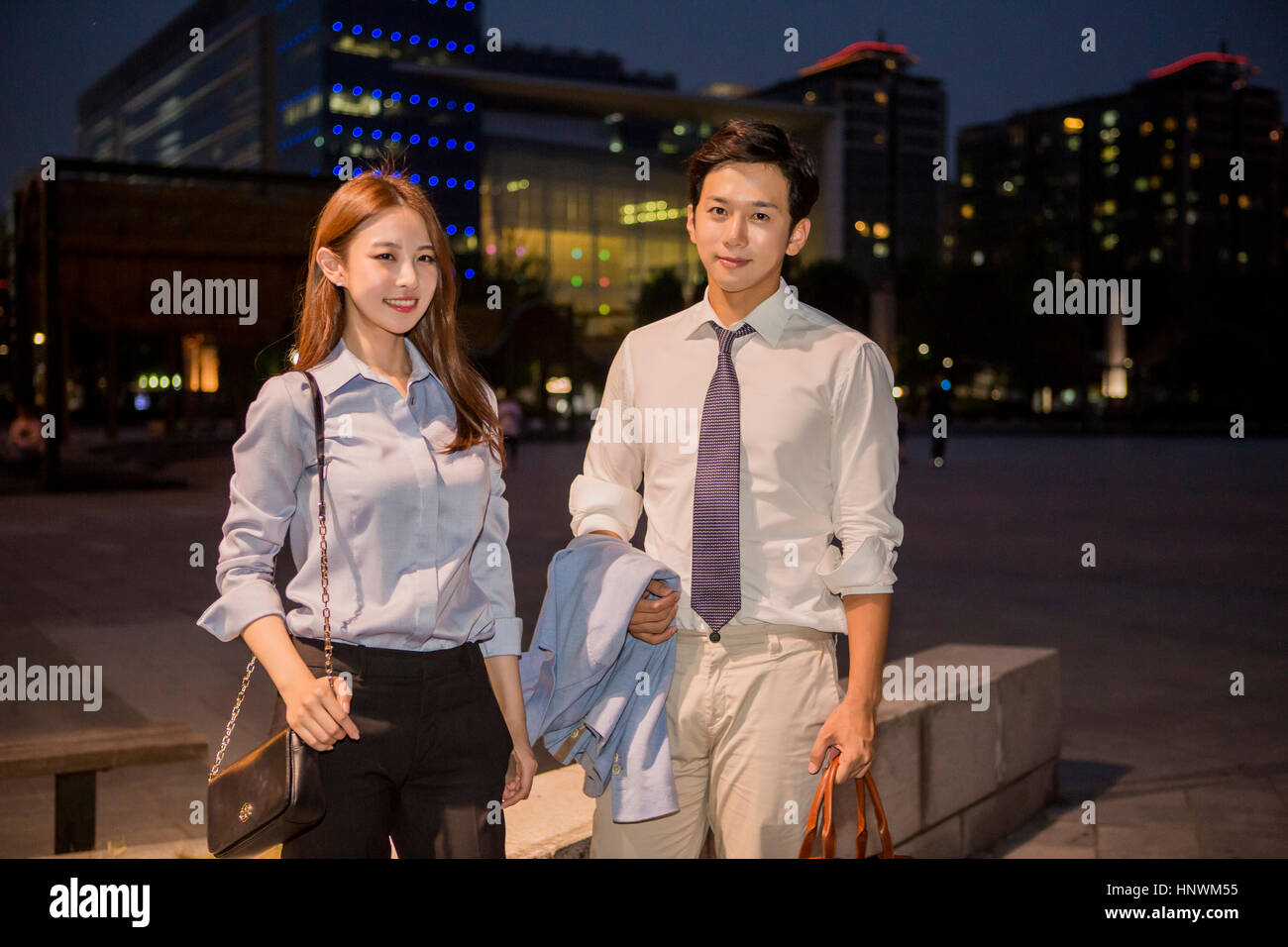 Young smiling business people Stock Photo - Alamy