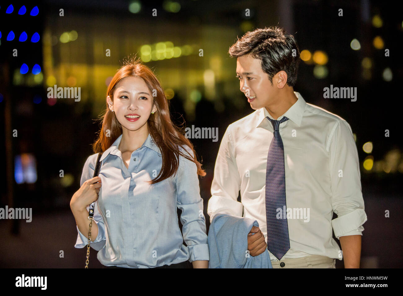 Young smiling business people Stock Photo - Alamy