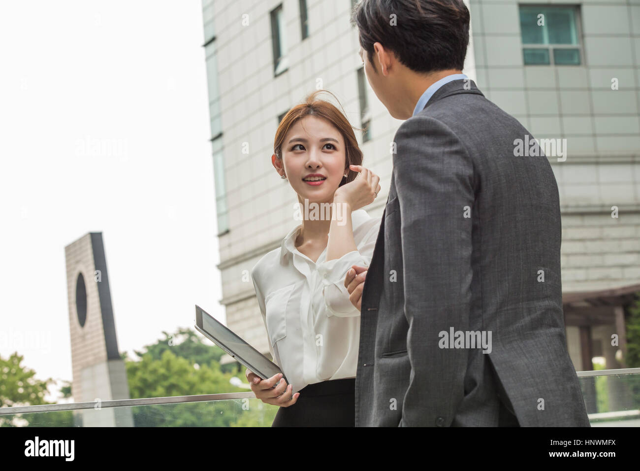 Young smiling business people Stock Photo - Alamy